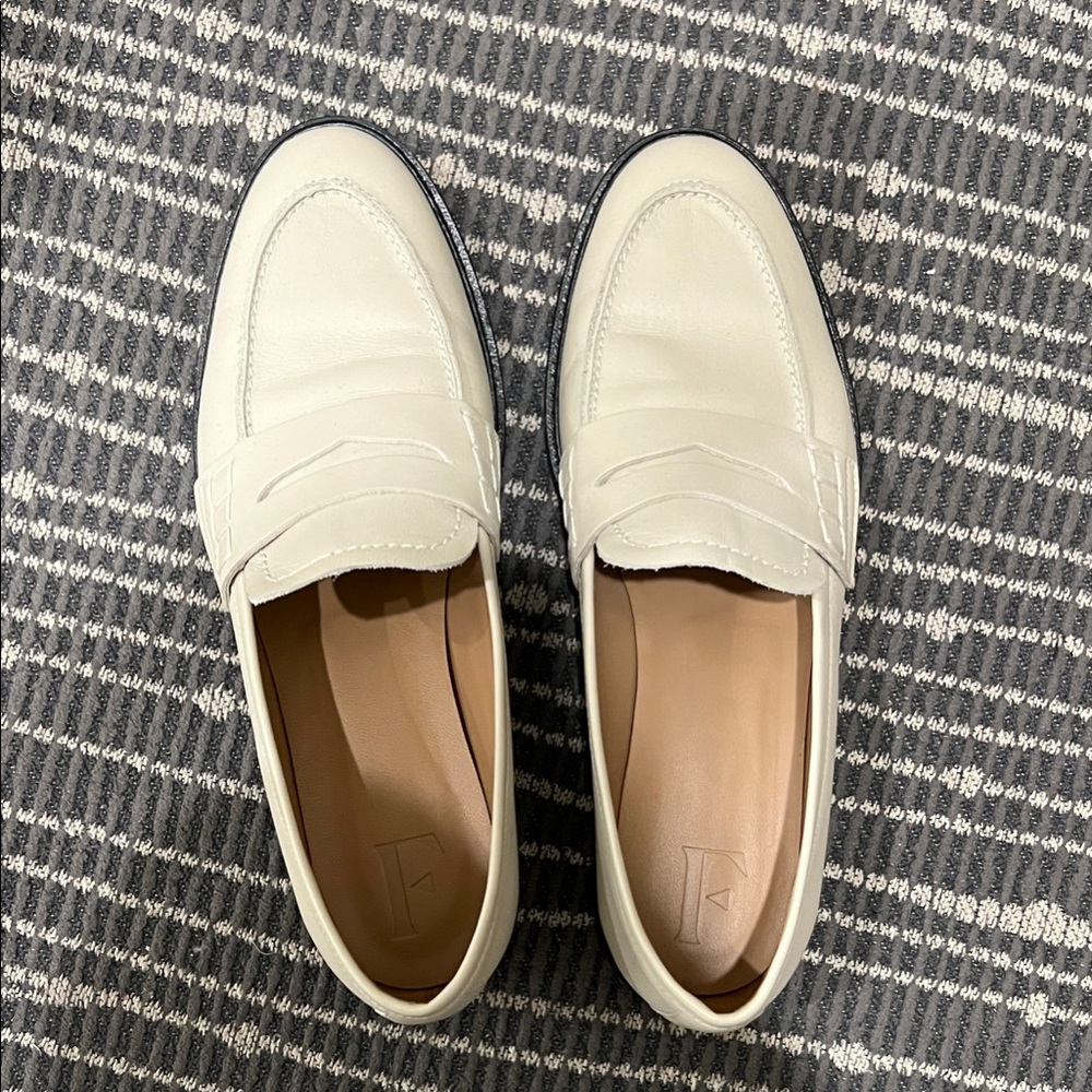 Flattered Off White and Black Sole Loafers
